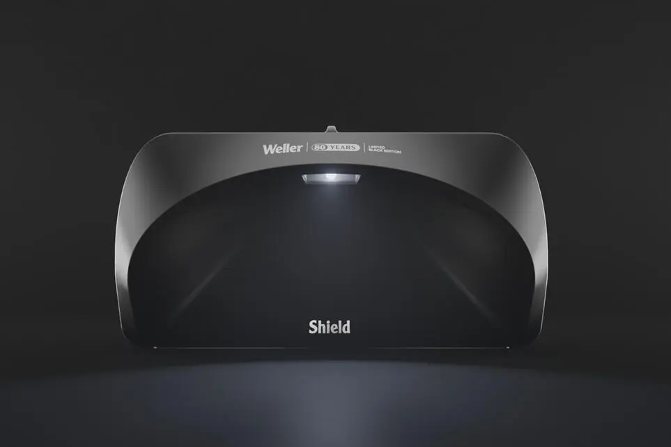 Weller ZeroSmog Shield fume extraction unit, Black Edition released for the brand’s 80th anniversary. The device is shown from the front against a dark background, featuring the Shield logo and integrated work light.