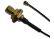Coaxial Cable, SMA jack (straight) to AMC plug (angled), 50 Ω, 1.13 mm micro cable, grommet black, 200 mm
