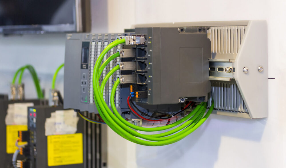 Understanding and using PLCs: automatic Programmable Logic Controller PLC high precision equipment for machine or manufacturing process control in industrial