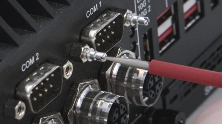 Step 1: Screw the upgrade pin into the screw lock on the side of the device.